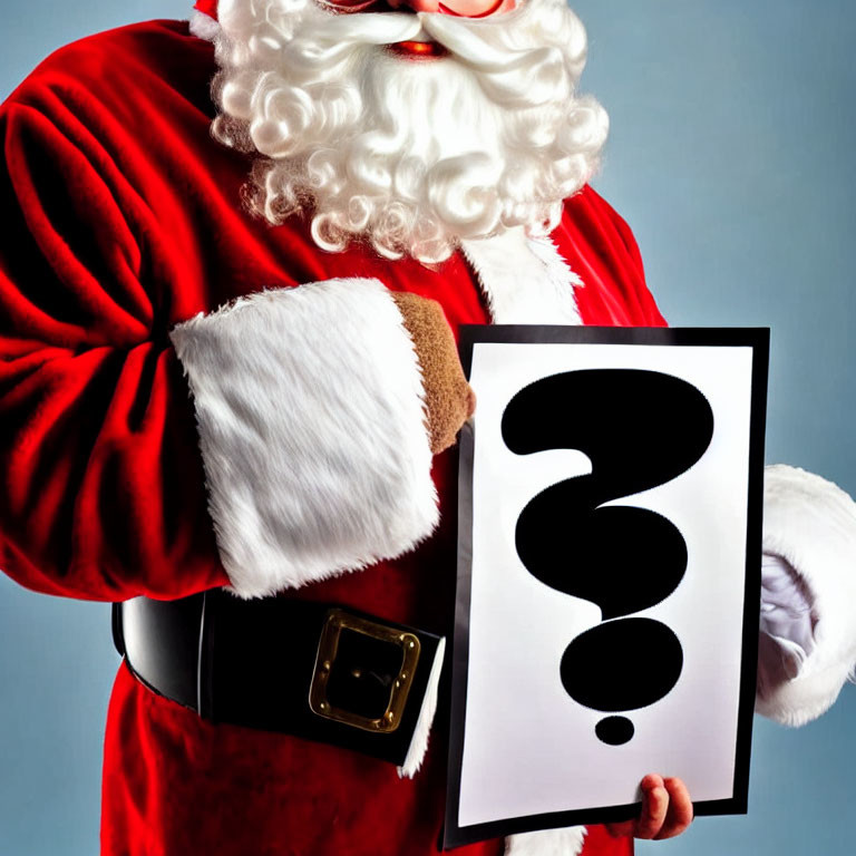 Santa Claus costume person holding question mark sign on blue background