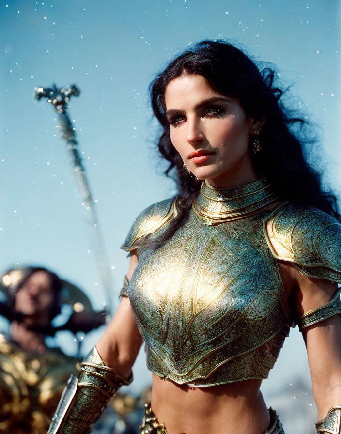 Elaborate golden armor woman against blue sky backdrop with blurred figure