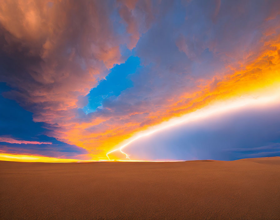 Vibrant blue and orange hues in dramatic desert sky