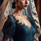 Detailed teal lace gown bride with scalloped-edged veil poses elegantly