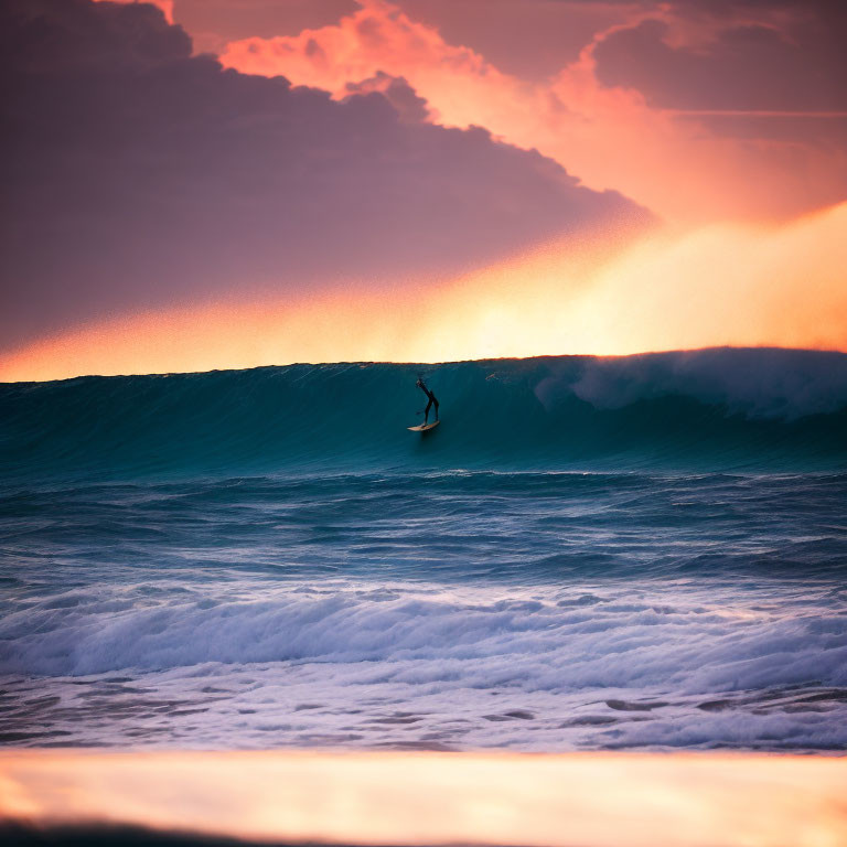 Silhouette of person paddleboarding on wave at vibrant sunset