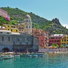 Colorful Landscape with Houses, Flowers, Butterflies, and Musical Instruments