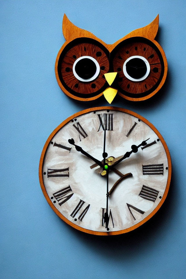 Vintage Owl-Shaped Wall Clock with Roman Numerals on Blue Background