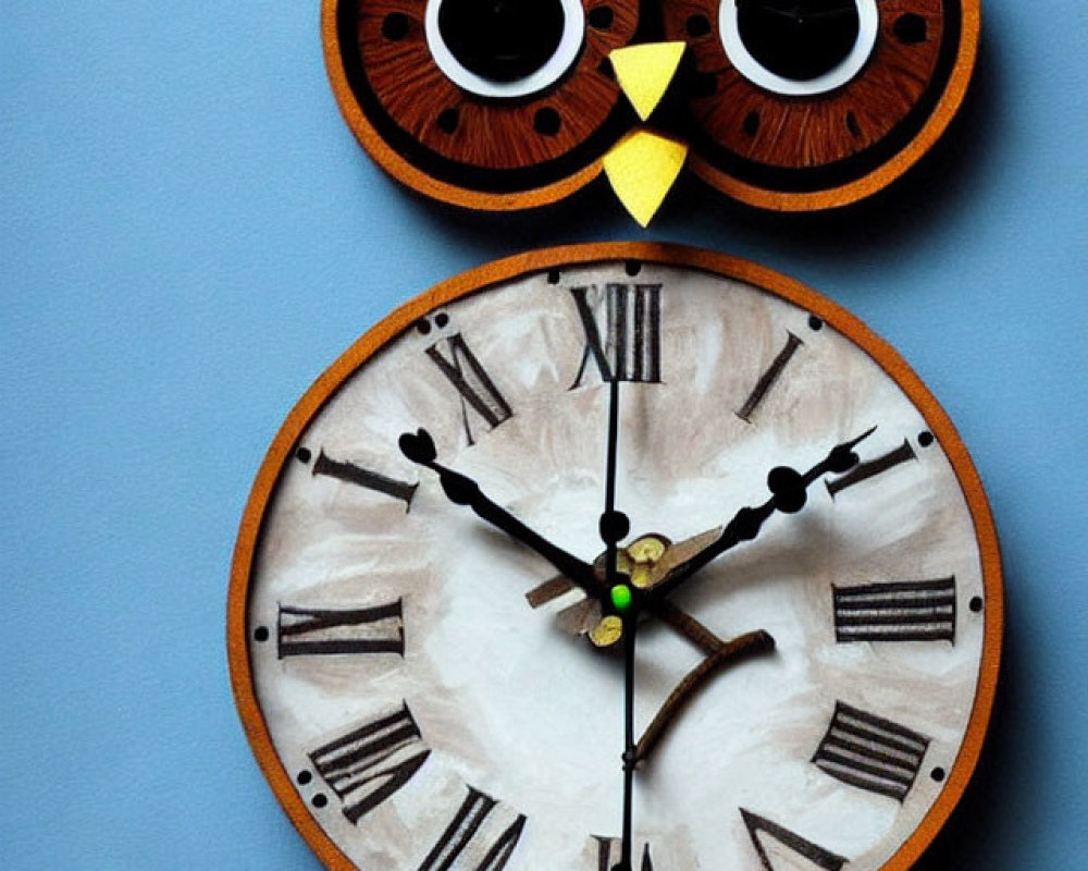 Vintage Owl-Shaped Wall Clock with Roman Numerals on Blue Background