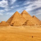 Ancient Pyramids of Giza with Camel and Flying Planes