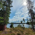 Tranquil Landscape with Wooden Gate and Winding Path