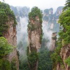 Mysterious fantasy landscape with ancient ruins and misty towers