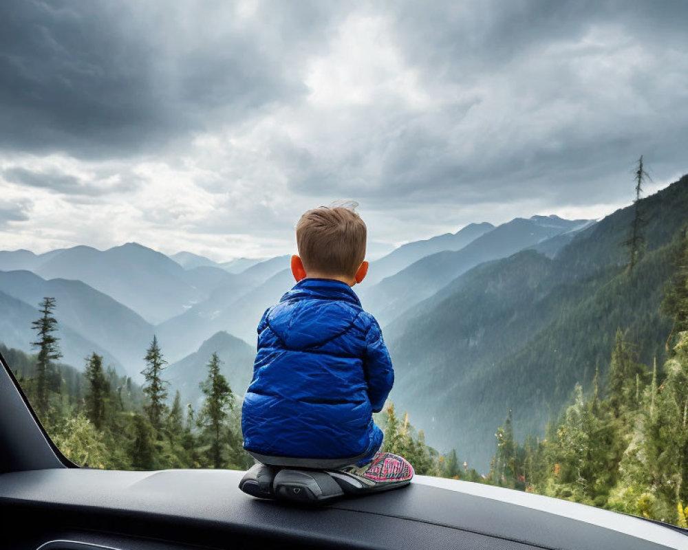 Child in Blue Jacket on Car Dashboard Observing Mountain Range Under Cloudy Sky