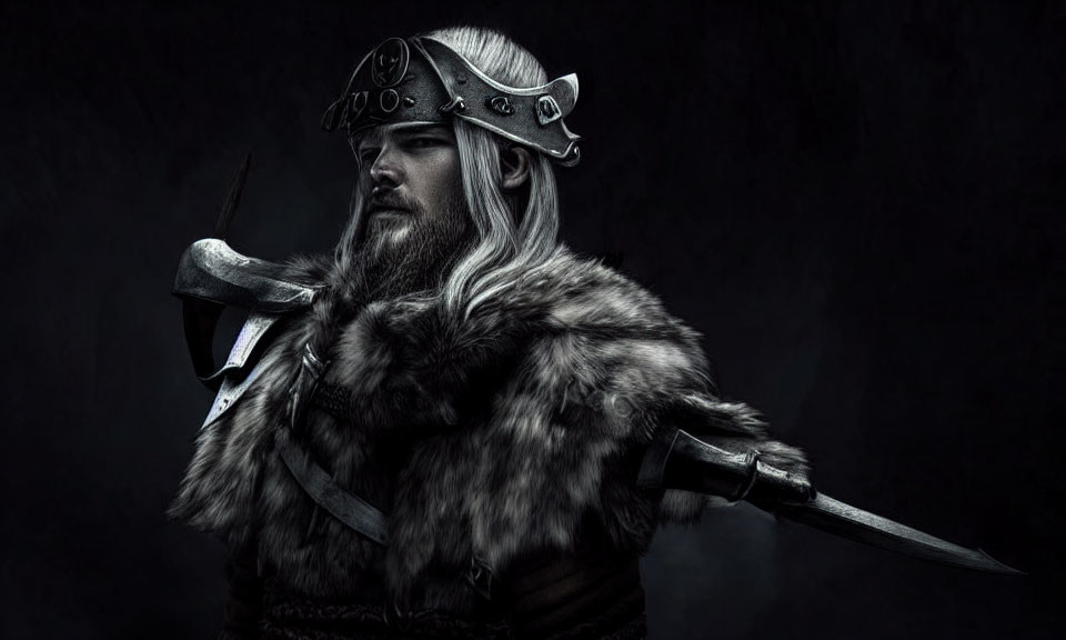 Bearded warrior in Viking armor with sword on dark background