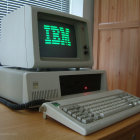 Vintage-style Gold and White Computer on Intricate Golden Desk