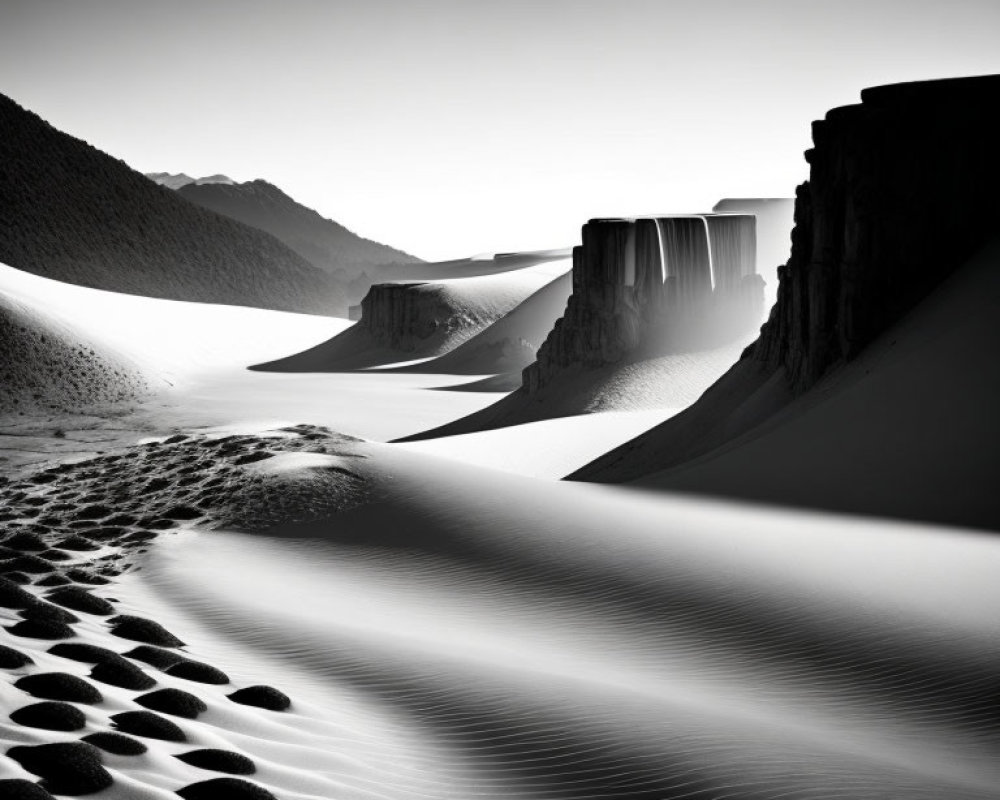 Sharp-edged monochrome desert landscape with contrasting light and shadows