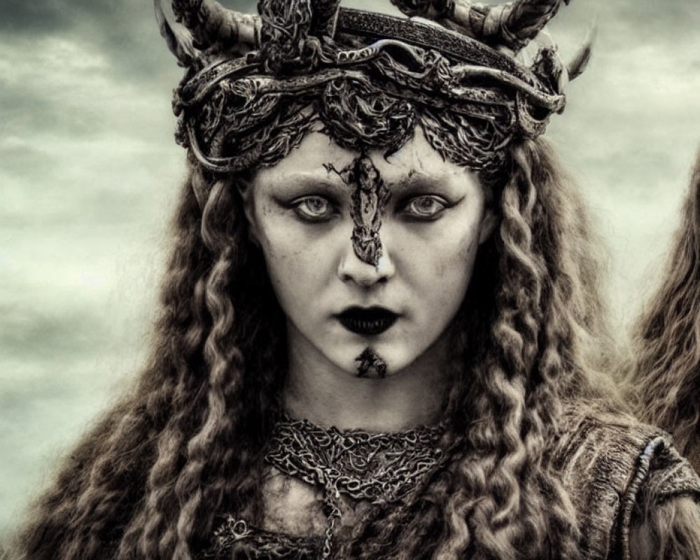 Dark, intricate horned headpiece on woman with eerie makeup and forehead symbol representing mystical or pagan vibe