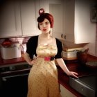 Vintage portrait of woman with beehive hairstyle in retro kitchen