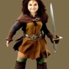 Fantasy female warrior collectible figure in brown leather armor with sword