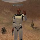 Lizard-like humanoid in futuristic white armor in desert landscape