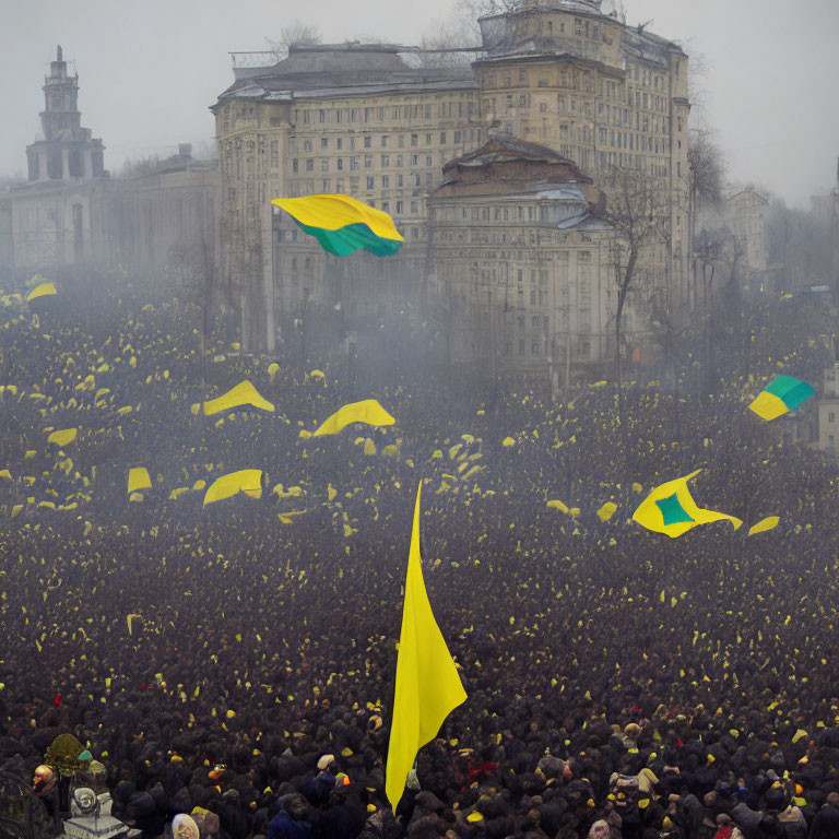 Crowd with yellow flags in foggy city square demonstration.