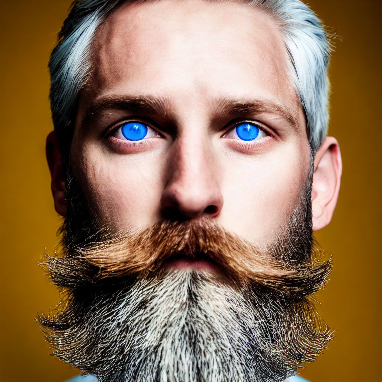 Man with Blue Eyes, Beard, and Mustache on Yellow Background