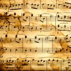 Stylized woman with flowing hair in abstract swirls and musical notes on golden background