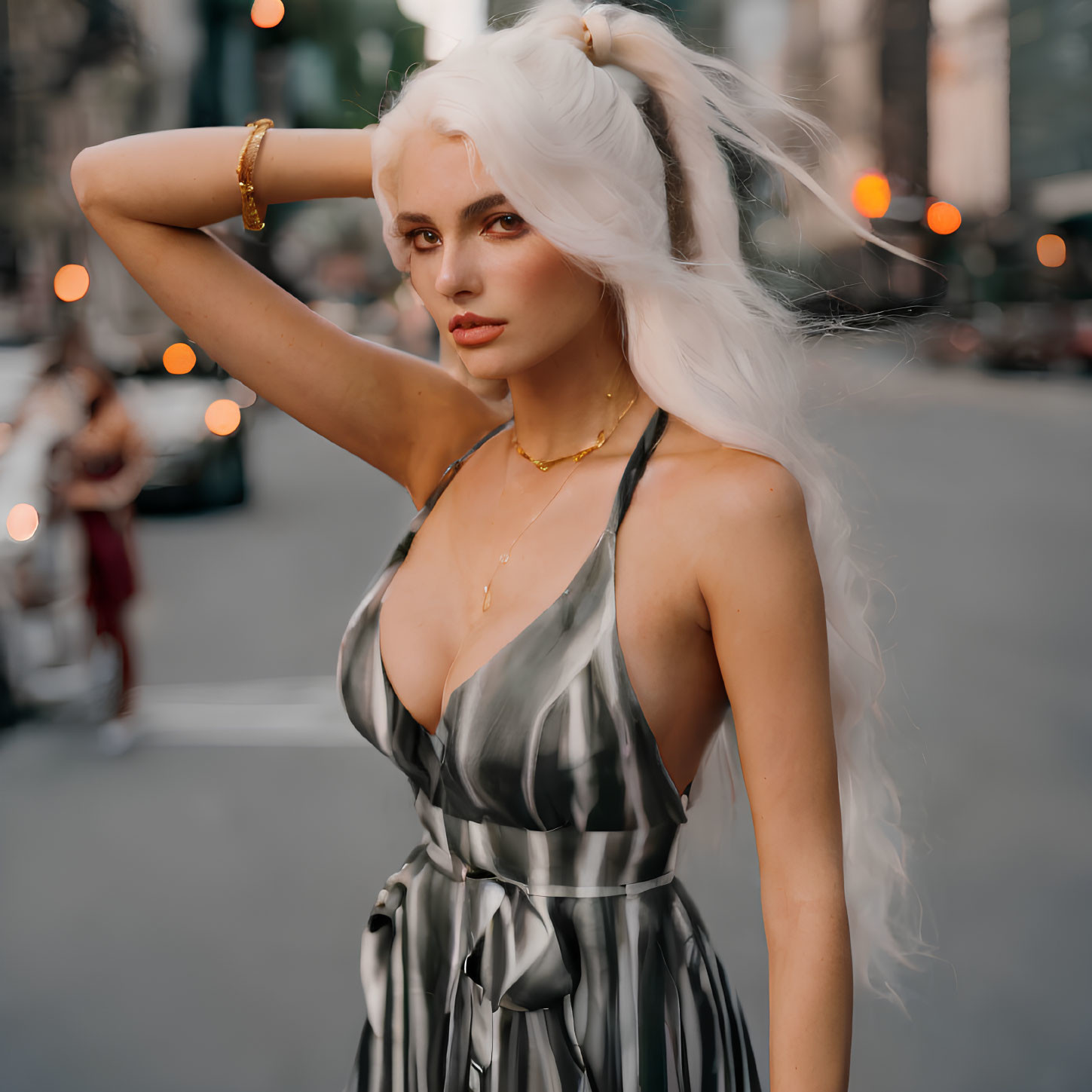 White-haired woman in pigtails in striped dress on city street