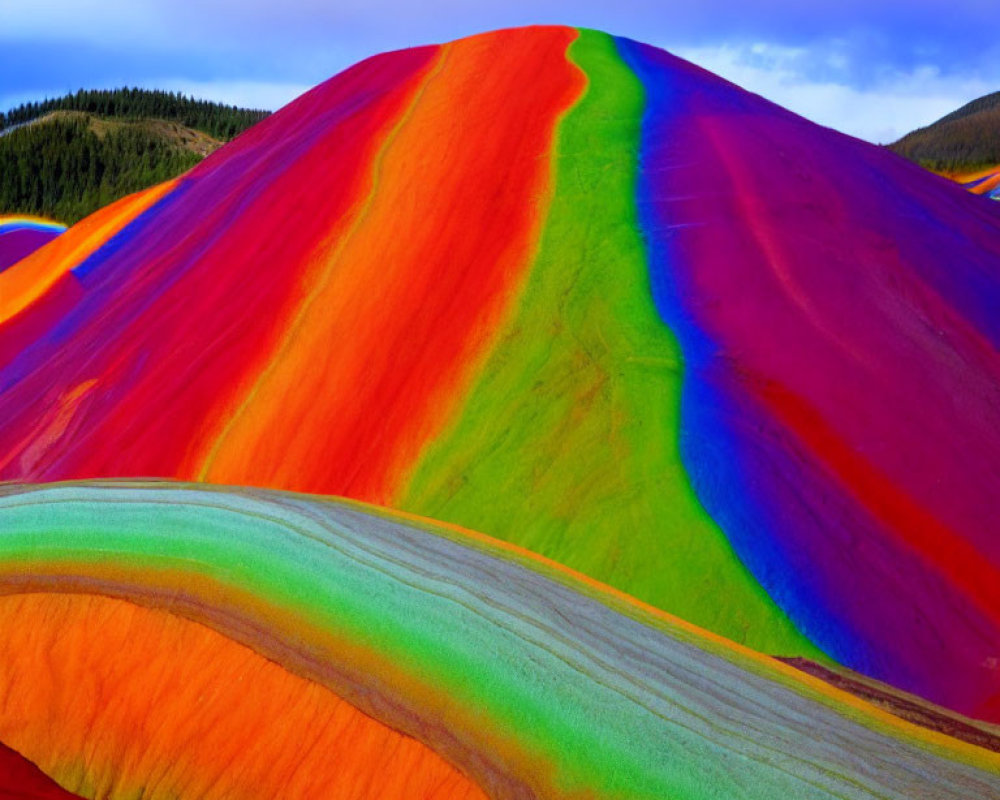 Colorful Hills Blend Against Forest and Sky