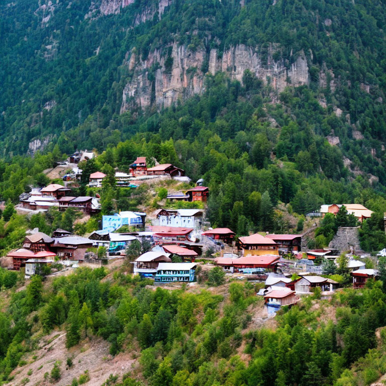 Scenic mountain village with colorful houses and lush green surroundings