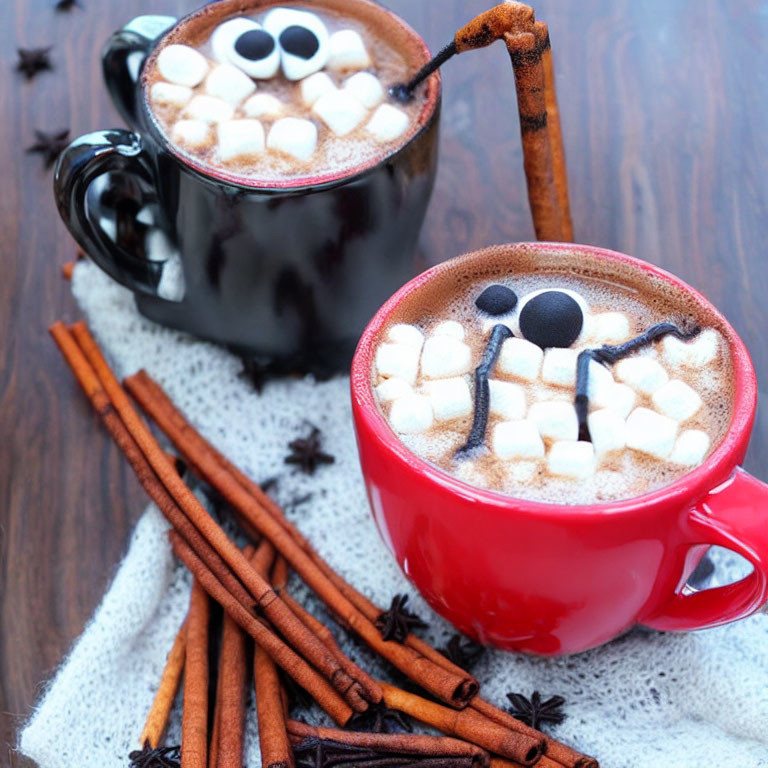 Hot Chocolate Mugs with Marshmallows, Cinnamon, and Star Anise on Wooden Surface