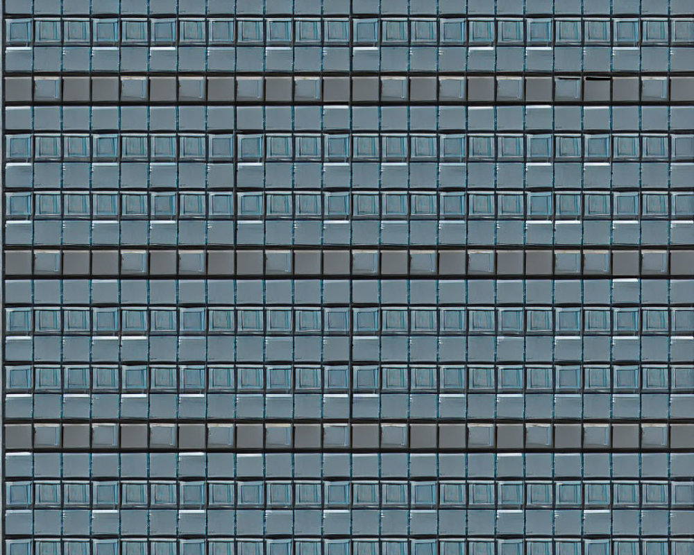 Blue-tinted window pattern on modern high-rise building facade