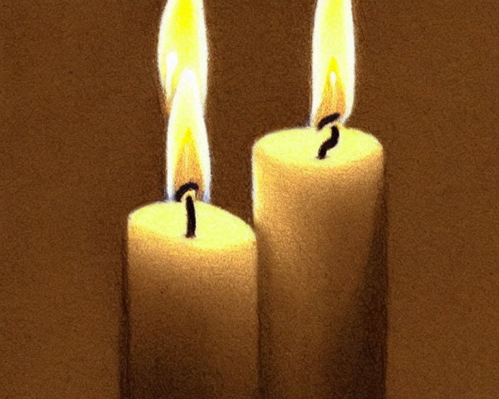 Glowing Flames of Two Lit Candles on Dark Background