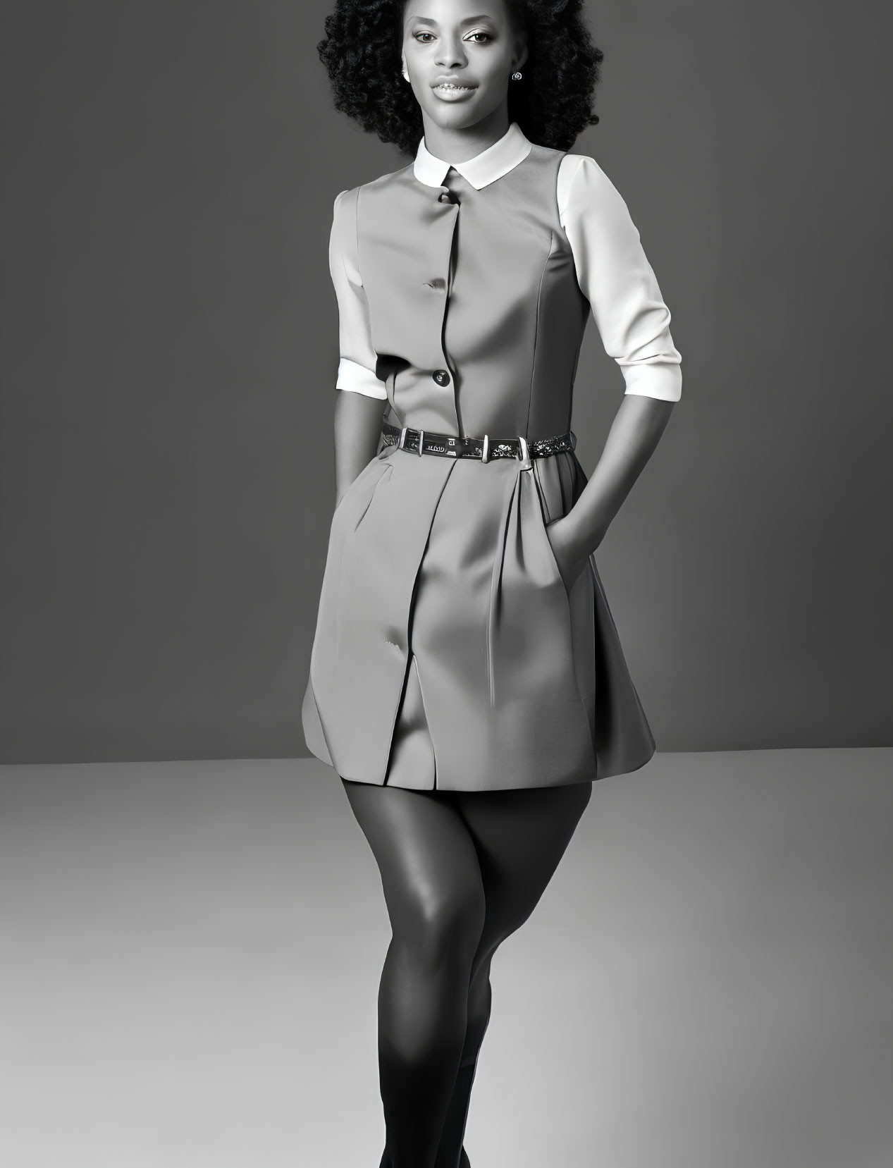 Stylish black and white photo of woman in short-sleeve dress