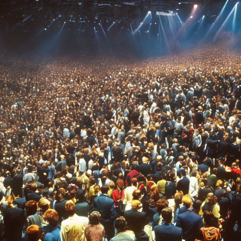 Crowd at Concert Under Bright Stage Lights