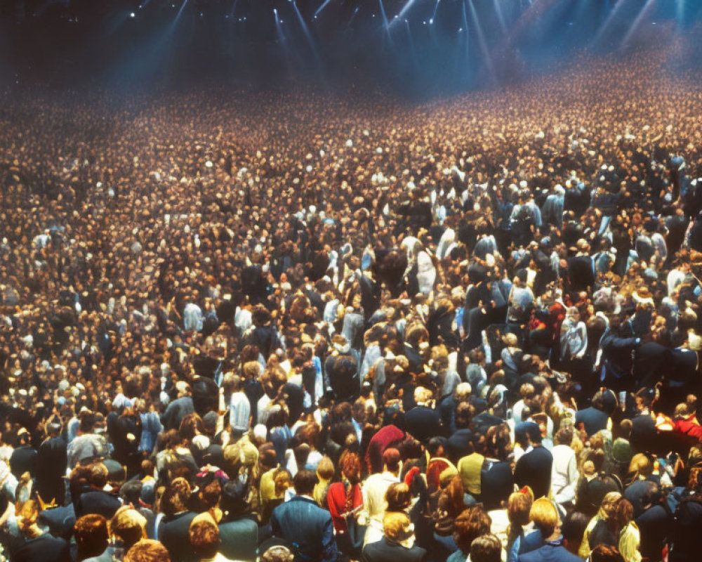 Crowd at Concert Under Bright Stage Lights