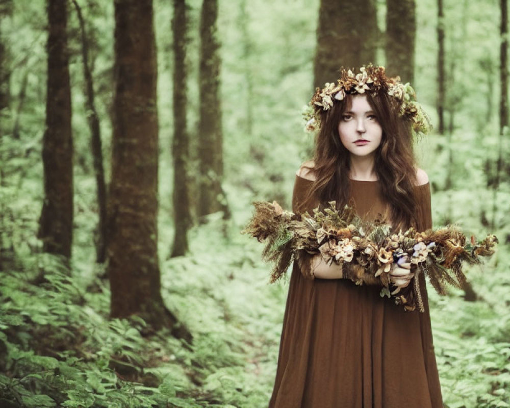 Woman in Brown Dress with Floral Wreath Standing in Lush Green Forest