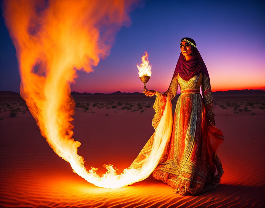 Woman in vibrant traditional dress with flaming torch in desert sunset scene