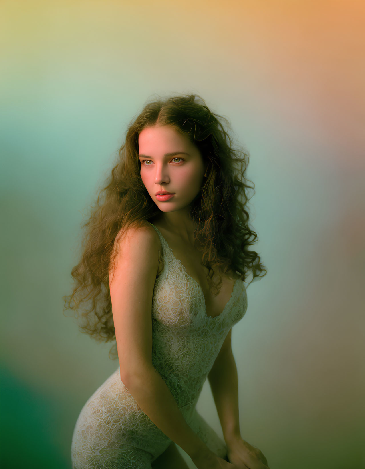 Long Wavy Hair Woman in Lace Garment with Soft-Focus Background