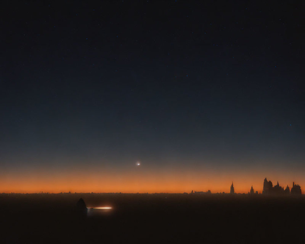 Starry nightscape with silhouetted buildings and orange horizon