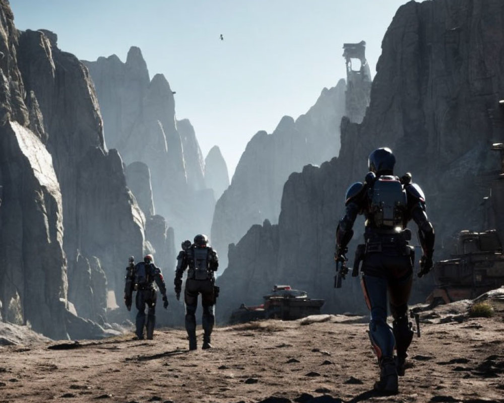 Astronauts in space suits explore rocky terrain with cliffs and structure in the distance