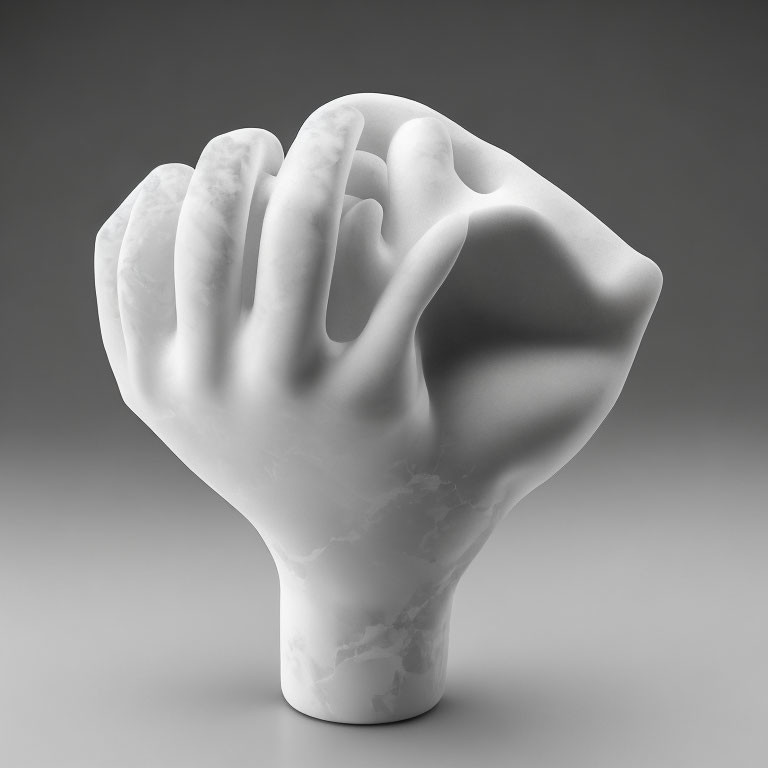 Marble Hand Sculpture Resting on Gray Background