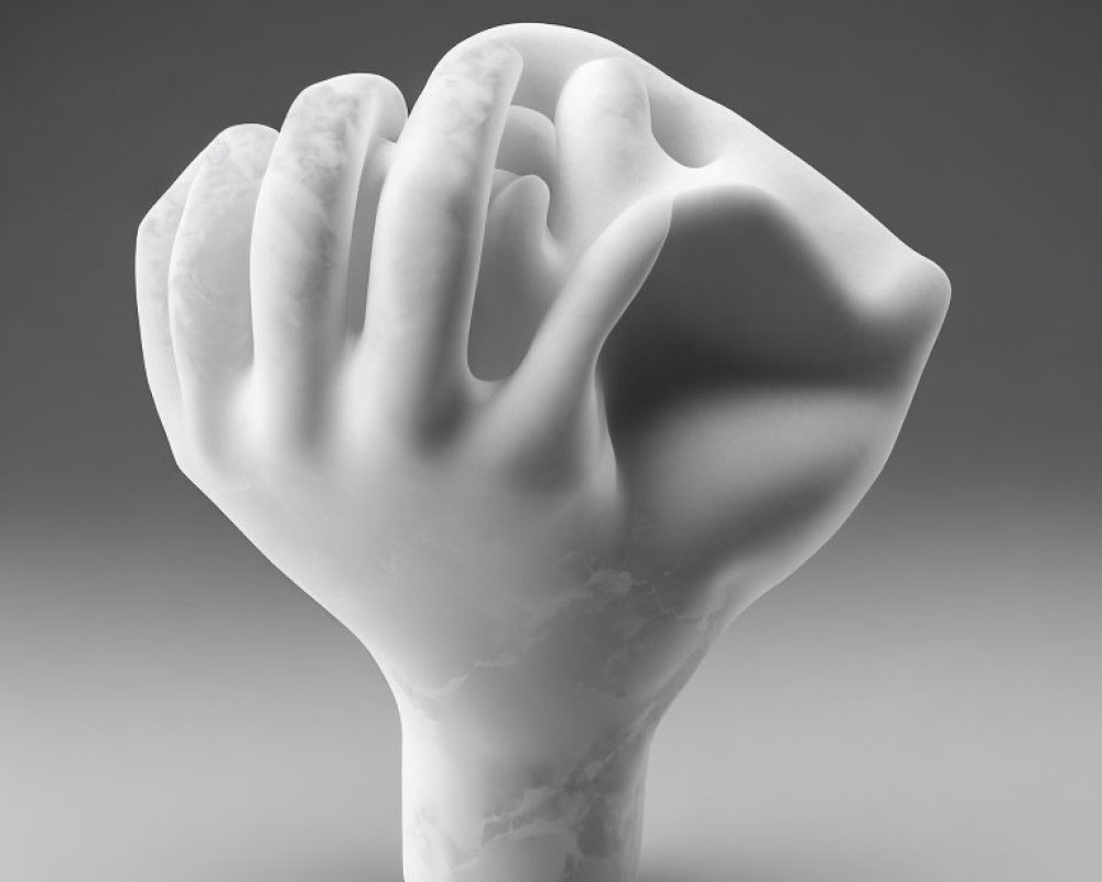 Marble Hand Sculpture Resting on Gray Background