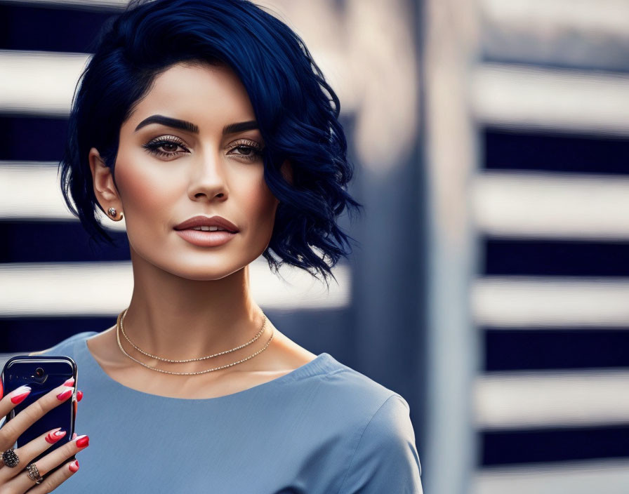 Woman with Short Blue Hair Holding Phone Against Striped Background