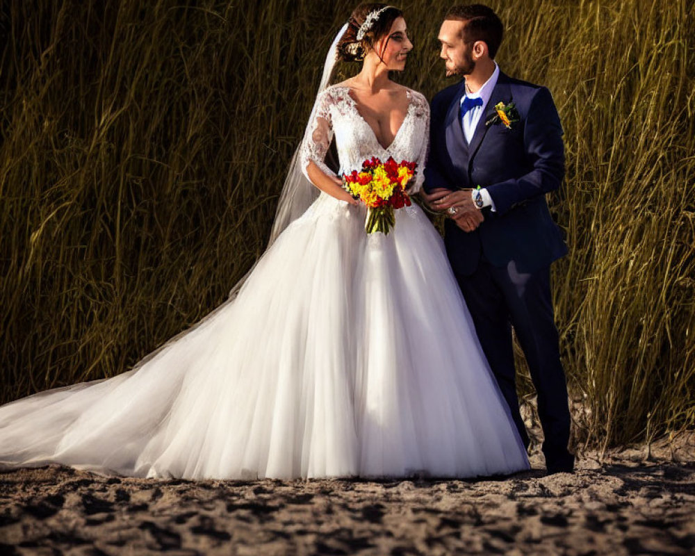 Bride and Groom Embrace on Sandy Beach