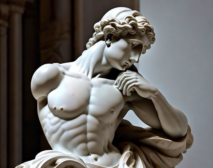 Muscular male sculpture with curly hair and contemplative pose