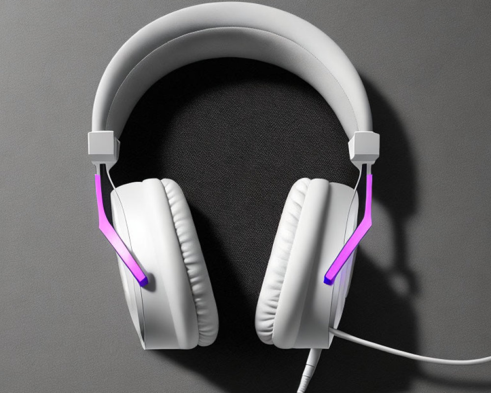 White Over-Ear Headphones with Purple Lighting on Dark Grey Background