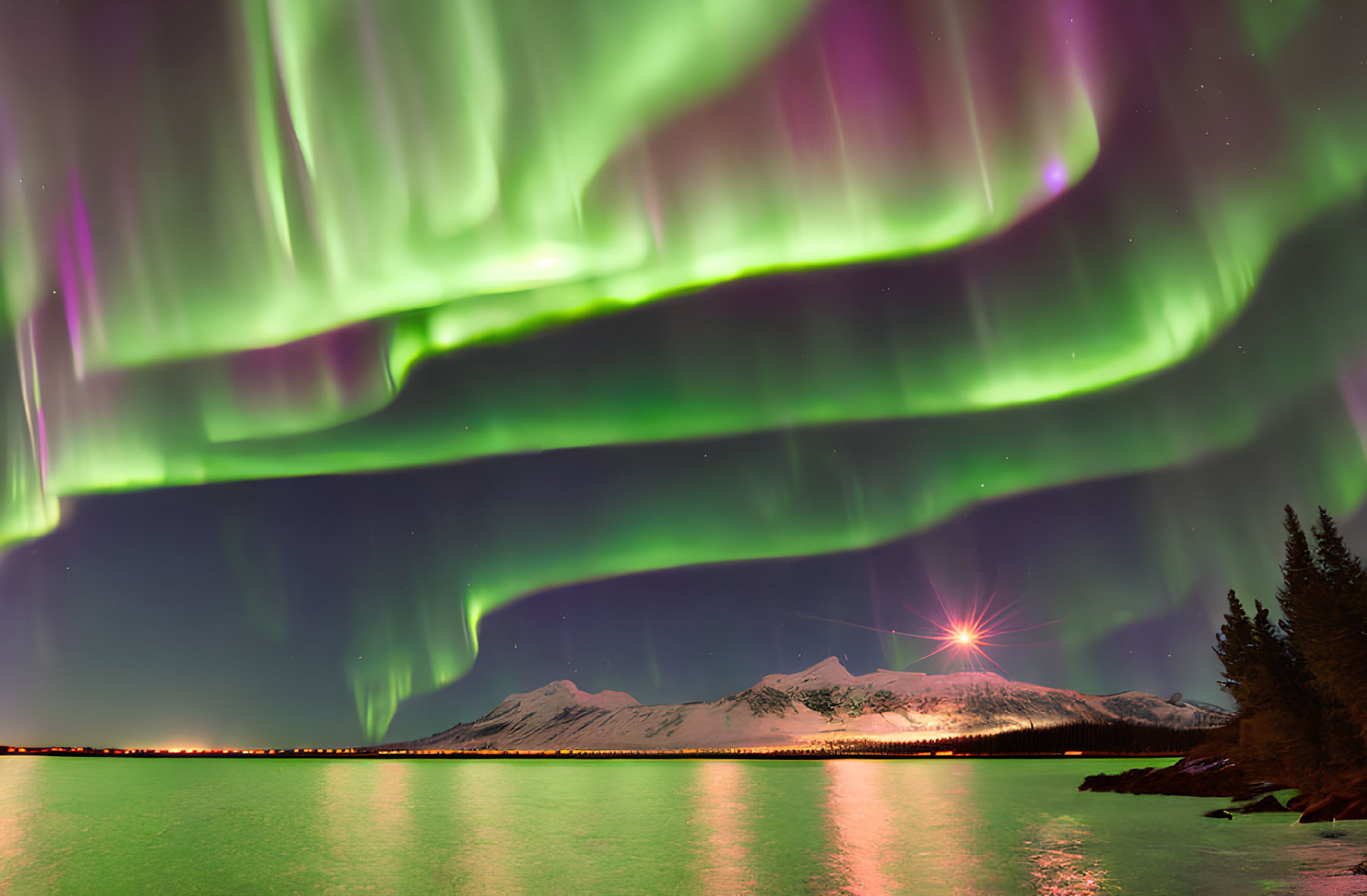 Vibrant green aurora borealis over snowy mountain landscape