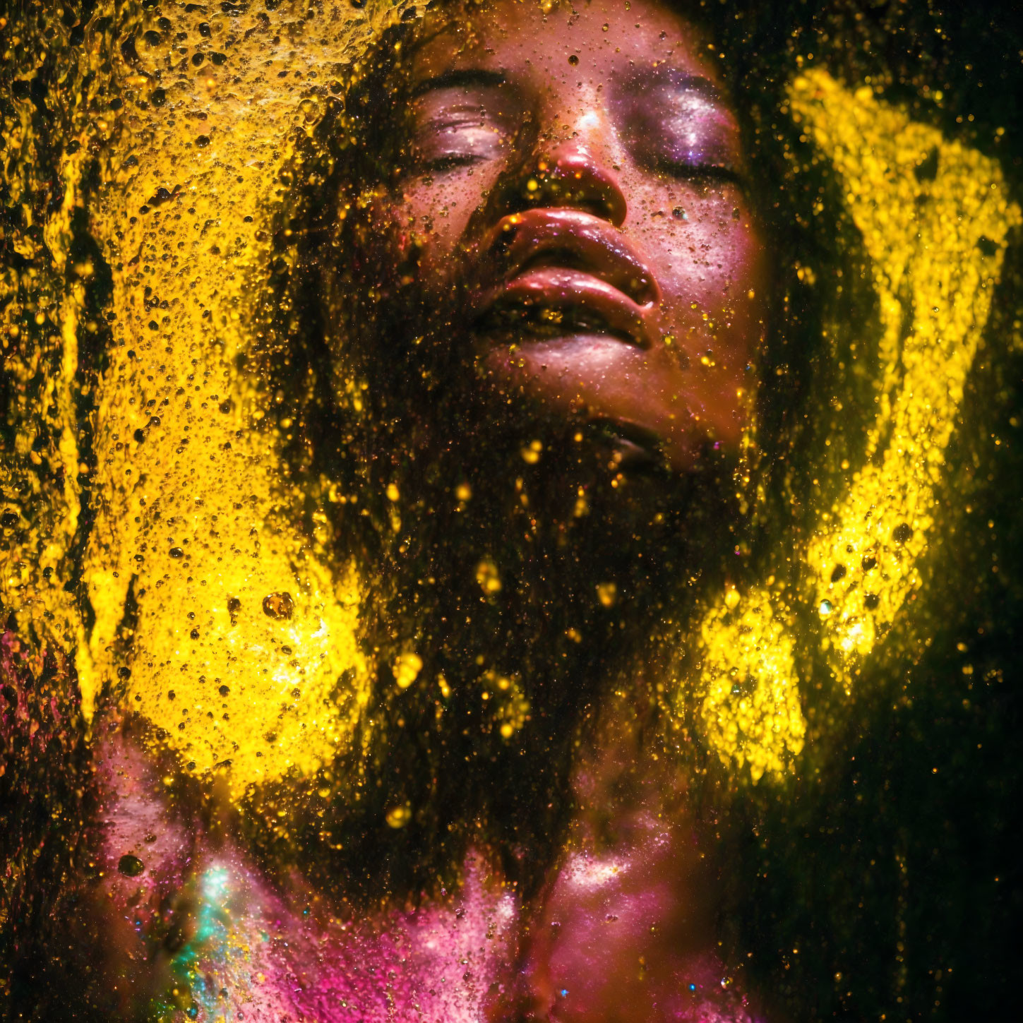 Person with Closed Eyes Surrounded by Yellow and Pink Colors