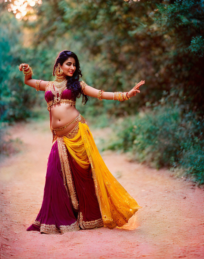 Traditional Indian Attire Woman Dancing in Forest Pathway