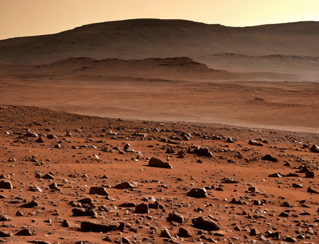 Barren Martian landscape with reddish soil and rocky terrain