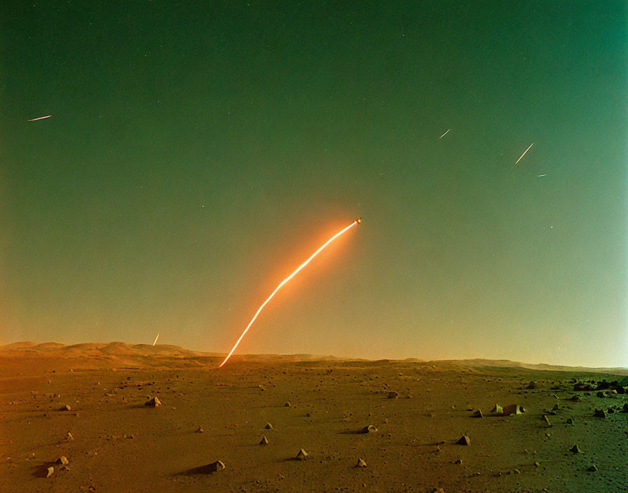 Martian landscape with orange sky and star trails.