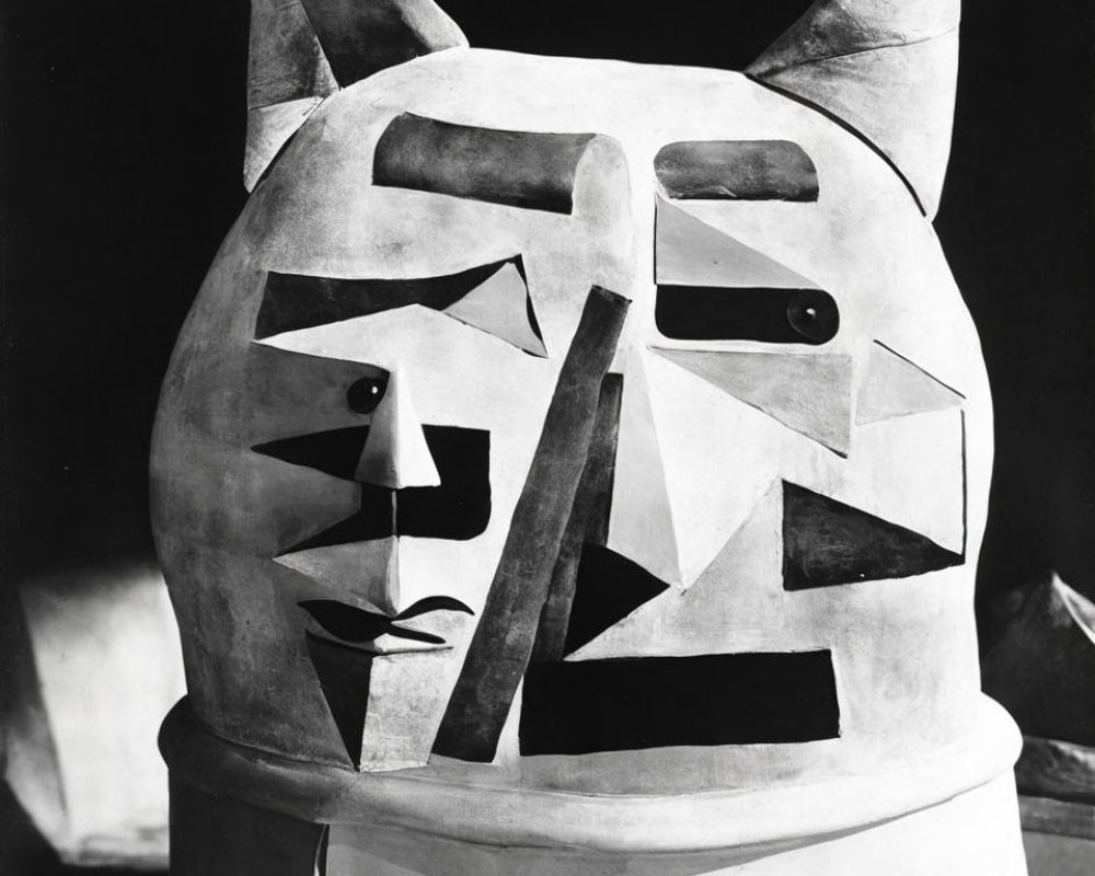 Monochromatic abstract photo of cubist-style head sculpture