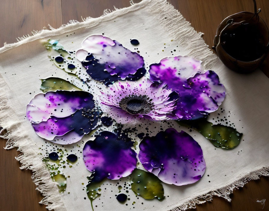 Vibrant Purple and Black Inkblot Flowers on Textured Cream Cloth