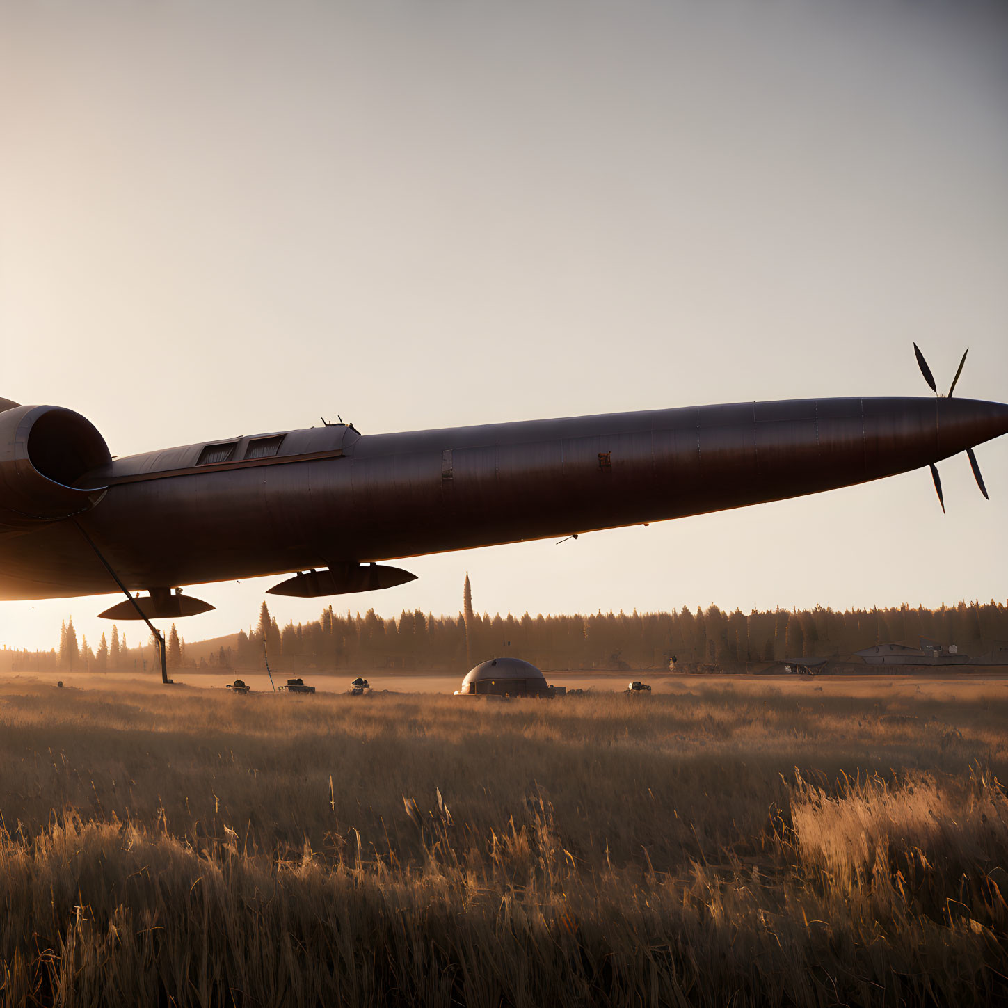 Propeller aircraft parked in field at sunset with trees and vehicles.